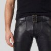 Close up detail of stitching and belt loops on leather pants